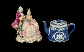 Dresden Porcelain Figure of a Courting Couple on a scroll gilt base with a jasper-ware adams blue