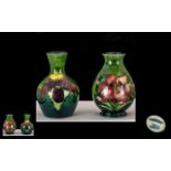 Moorcroft Pair of Small Vases ( 2 ) ' Orchids ' Design and Freesia Design on Emerald Green Ground,