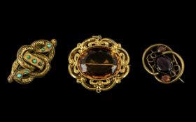 Three Victorian Brooches comprising one Turquoise, one Citrine, and one Garnet & Citrine.