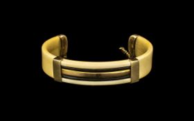 Designer Ivory & Gold 9ct Stamped Bangle in the Art Deco style, with safety gold chain.