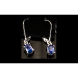 Sapphire Solitaire Drop Earrings, a pair of oval cut blue sapphire solitaires, totalling 1.