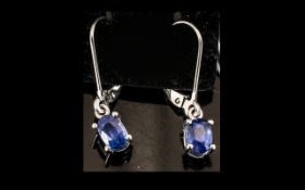 Sapphire Solitaire Drop Earrings, a pair of oval cut blue sapphire solitaires, totalling 1.