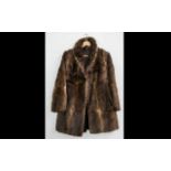 Ladies Three Quarter Length Fur Coat. Shawl collar, hook and eye fastening, fully lined in brown