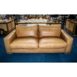 Quality Large Luxury Leather Sofa by Natuzzi in light tan leather.