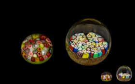 Two Millefiori Paperweights - Early to Mid Century Paperweights. Please see accompanying image.