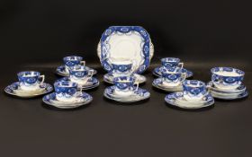 Part Tea Service by Doric China England comprising 8 cups, 11 saucers, 12 side plates,