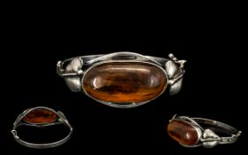 Baltic Amber Antique Art Nouveau Silver Bracelet with sinuous entwining leaves, surmounted with a