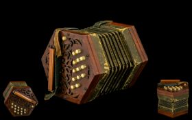 An AntiqueThirteen Buttoned Mahogany Concertina with decorated paper bellows,