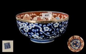 Japanese Imari Bowl of Typical Palette the outside body decorated in underglazed blue.