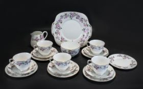 Staffordshire Bone China Crown Part Tea Set comprising milk jug, sugar bowl, five saucers, five