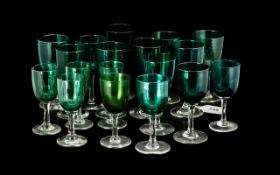 A Collection of Eighteen Victorian Green Coloured Wine Glasses with opaque stems.