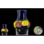 William Moorcroft Signed Large Bulbous Shaped Vase 'Wisteria Plums' design on blue ground circa