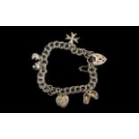 Silver Charm Bracelet hallmarked silver, charm bracelet with various charms.
