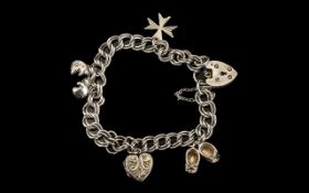 Silver Charm Bracelet hallmarked silver, charm bracelet with various charms.