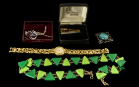 Mixed Lot Of Costume Jewellery To Include A Pendant And Chain, Tie Clip, Wristwatch, Necklace etc.