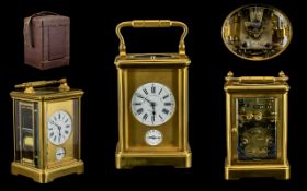 French 19th Century Gilt Brass Repeater Carriage Clock with alarm facility signed to dial