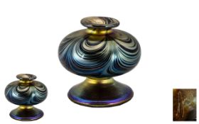 An Iridescent Glass Squat Bud Vase in the Ditchfield style. Signed to base. Measuring 3.