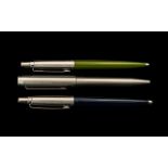 Three Parker Pens. Comprising one stainless steel, one blue, and one green. Please see images.