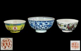 Transitional Ming Period Decorated Blue Bowl decorated with trailing flowers and vines to the