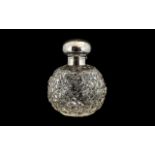 Early 20th Century Silver Topped Cut Glass Perfume/Scent Bottle. Hallmark Birmingham 1917.