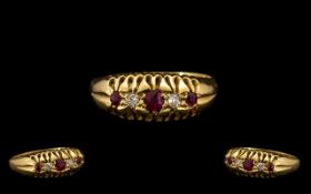 18ct Yellow Gold Attractive 5 Stone Ruby & Diamond Set Ring in a gallery setting.