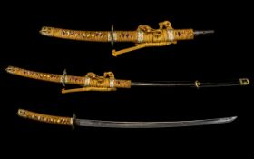 Japanese Replica Samurai Sword with Scabbard with a shapes Tsuba, with attachments 42" in length.