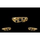 18ct Gold Ladies Attractive 5 Stone Sapphire & Diamond Dress Ring of good design and setting.