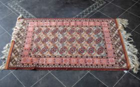 Persian Carpet, extremely fine quality, with a Tekke design to the central panel, vibrant colour.