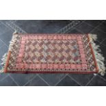 Persian Carpet, extremely fine quality, with a Tekke design to the central panel, vibrant colour.