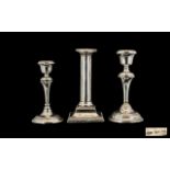 Silver Candle Sticks. Three hallmarked silver candle sticks, total weight 36 ounces.