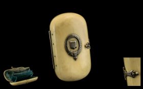 Antique Ivory Ladies Purse, blue silk lined to the interior, silver crest inlaid to the top,