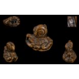 Stained Boxwood Carved Japanese Netsuke of a Toad with Horn Eyes,