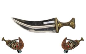 Middle Eastern Dagger & Sheath of typical Arab shape and design.