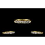 18ct Gold Nice Quality Seven Stone Diamond Ring - in a gallery setting. All seven brilliant cut