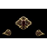 9ct Gold Attractive Garnet Set Cluster Ring flowerhead design, full hallmark for 9.375.