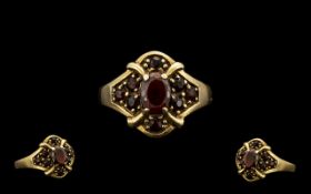 9ct Gold Attractive Garnet Set Cluster Ring flowerhead design, full hallmark for 9.375.