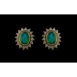 Pair of Opal Stud Earrings surrounded by