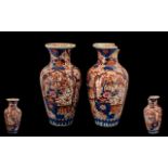 Pair of Imari Vases measuring 15" tall,