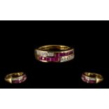 Ruby Band Ring, a double row ring compri