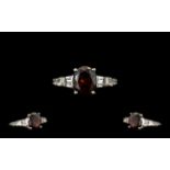 Red Garnet Solitaire Style Ring, a 4.25c