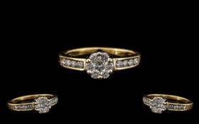 18ct Gold Attractive Flowerhead Diamond Set Dress Ring - marked 750 - 18ct. Set with top quality