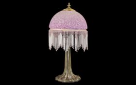 1920's Style Table Lamp of Pleasing Form with a Glass Shade.