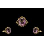 9ct Gold Amethyst Ring, Large Amethyst to Center. Ring Size - M. Please See Photo.