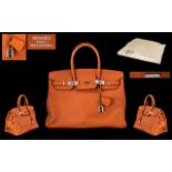 Hermes - Paris Birkin 35 Orange Swift Leather Bag.