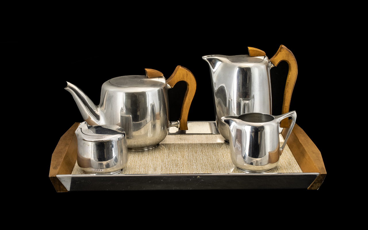 ( 4 ) Piece Picquot - Ware Alloy Tea Set with Wooden Handles on a Matching Tray.