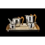 ( 4 ) Piece Picquot - Ware Alloy Tea Set with Wooden Handles on a Matching Tray.