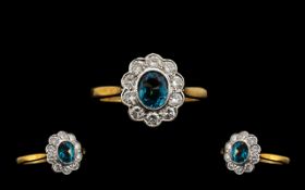 18ct Gold Diamond Cluster Ring Central Blue Zircon surrounded by 10 round modern brilliant cut