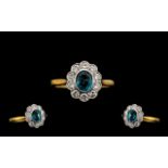 18ct Gold Diamond Cluster Ring Central Blue Zircon surrounded by 10 round modern brilliant cut