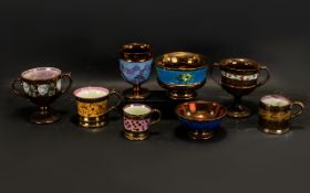 A Collection of Antique Staffordshire Copper Lustre Ware (8) in total decorated in various enamel