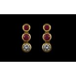 Ladies Attractive Pair of Ruby and Diamond Drop Earrings Set In 18ct Gold.